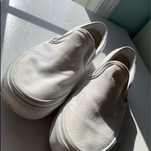 White slip on vans.